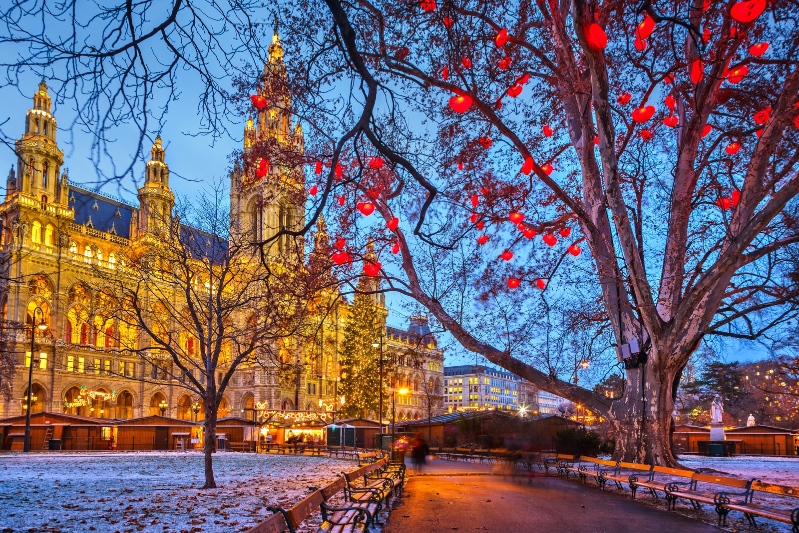 View of Vienna town hall behind bare tree branches